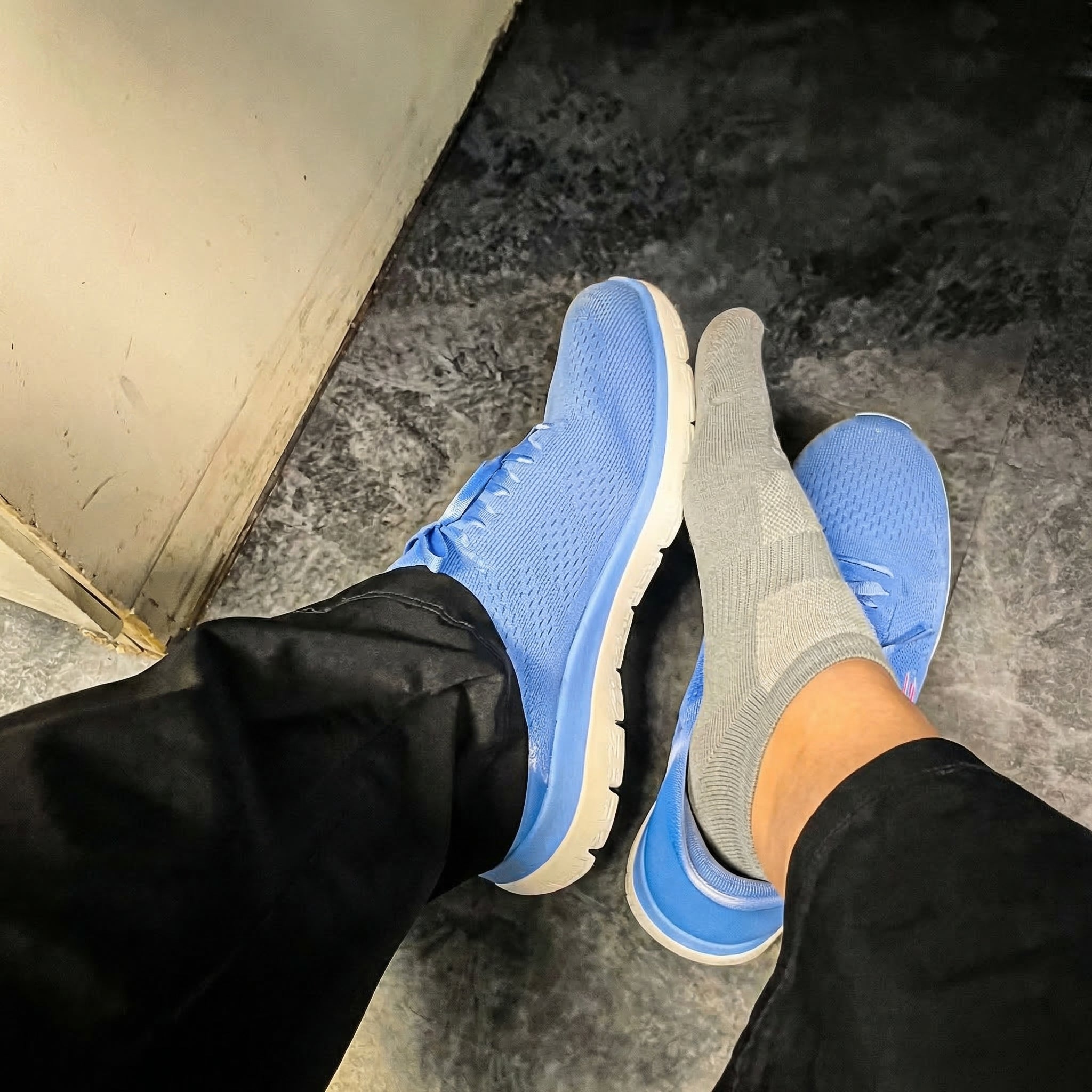 Nurse at desk holding WorkFit Insoles